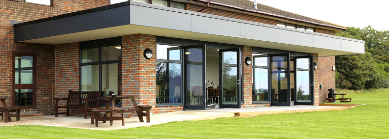 Exterior view of the stylish and modern extension to Hollingbury Golf Club in Brighton, East Sussex