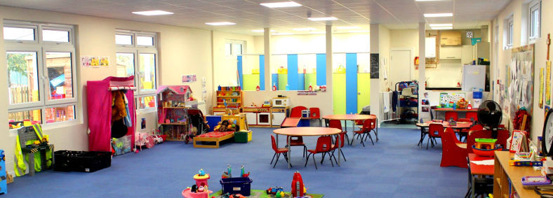 Interior view of the newly built Friary Pre-School in Crawley, West Sussex, showing the bright learning space and colourful interior.