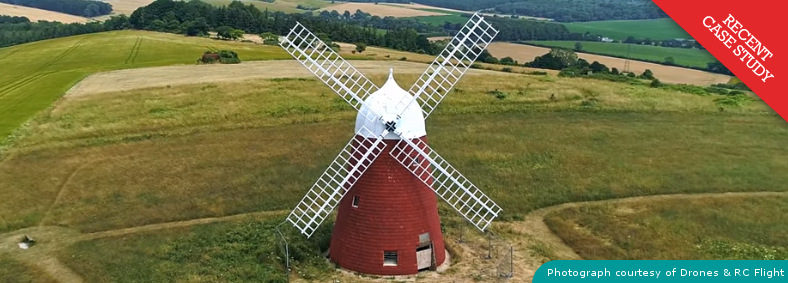Exterior view of Halnaker Windmill, a sympathetically and traditionally refurbished heritage building in Chichester, West Sussex