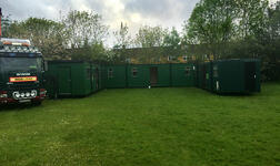Exterior view of temporary cabins installed to provide learning areas for the pre-school throughout the works.