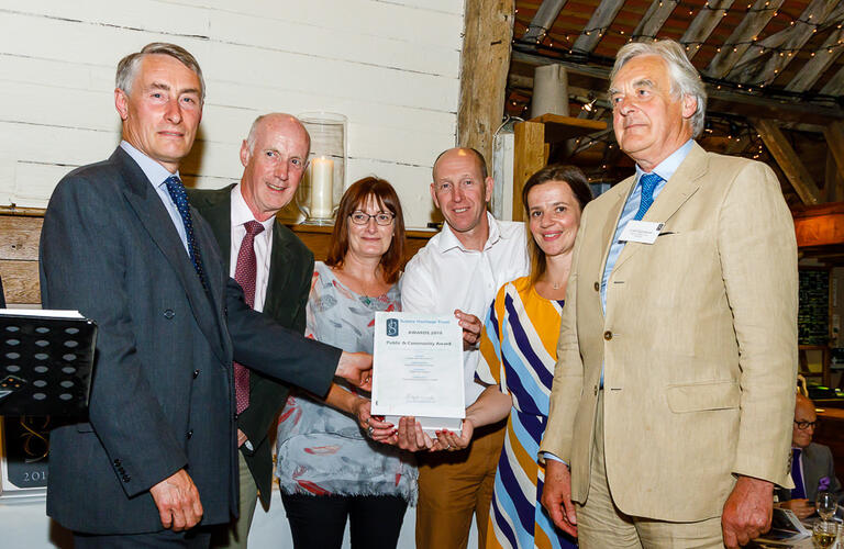 Photograph of Fowler managers Neil Smith and Mel Wegg receiving the Sussex Heritage Award for Public & Community